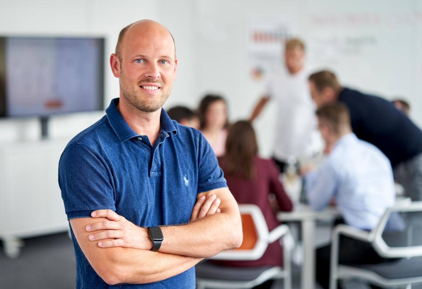 Businessportrait bei einem Teammeeting